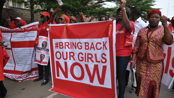 People attend a demonstration calling on the government to rescue the kidnapped girls of the government secondary school in Chibok, in Abuja, Nigeria on Oct. 14, 2014.