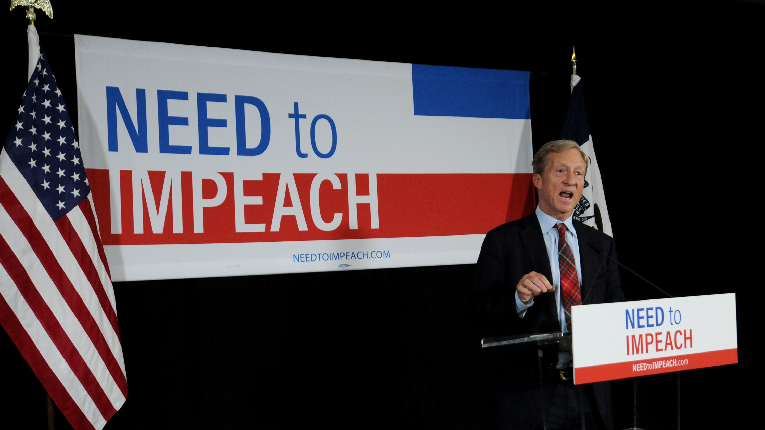 Billionaire activist Tom Steyer speaks to supporters in January in Des Moines, Iowa, where he announced he would not run for president. He's now reversed course. (Getty Images)