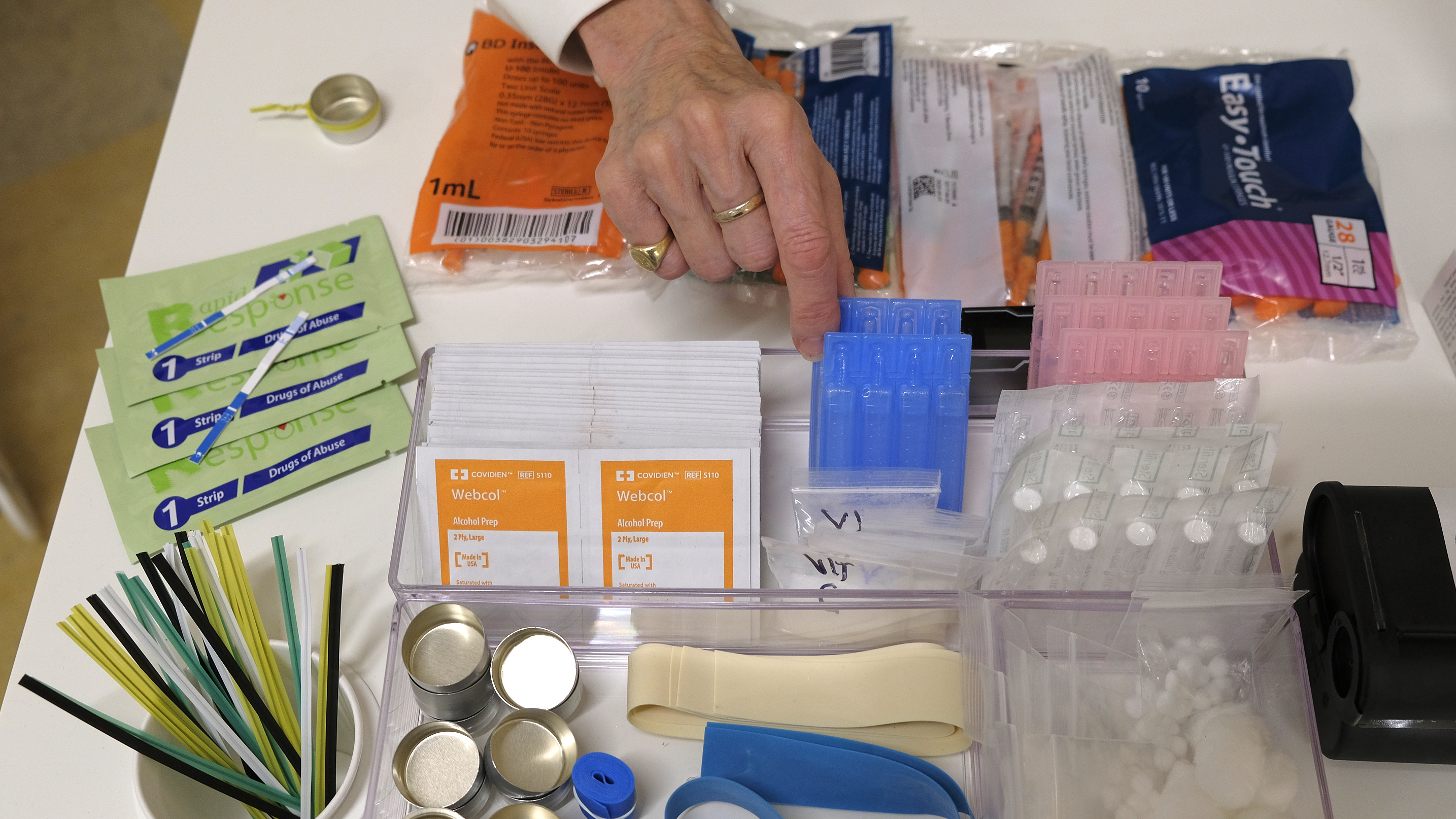 Supplies on a check-in desk at a model of a hypothetical  injection site in San Francisco, pictured here in September 2018. Local leaders from San Francisco are among a dozen local officials urging a federal court to approve of an effort to open a supervised injection site in Philadelphia.