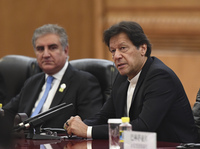 Pakistan's Prime Minister Imran Khan (right), shown here in April, will arrive in Washington, D.C., for a three-day visit that begins on July 21. His meeting with President Trump comes at a pivotal time for Afghan peace negotiations.