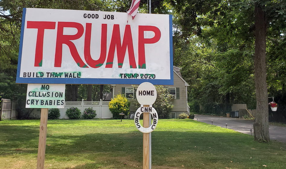 A pro-Trump sign next to B'nai Israel Reform Temple on Long Island, where Rep. Lee Zeldin, R-N.Y., is a member. (Charles Lane/WSHU)