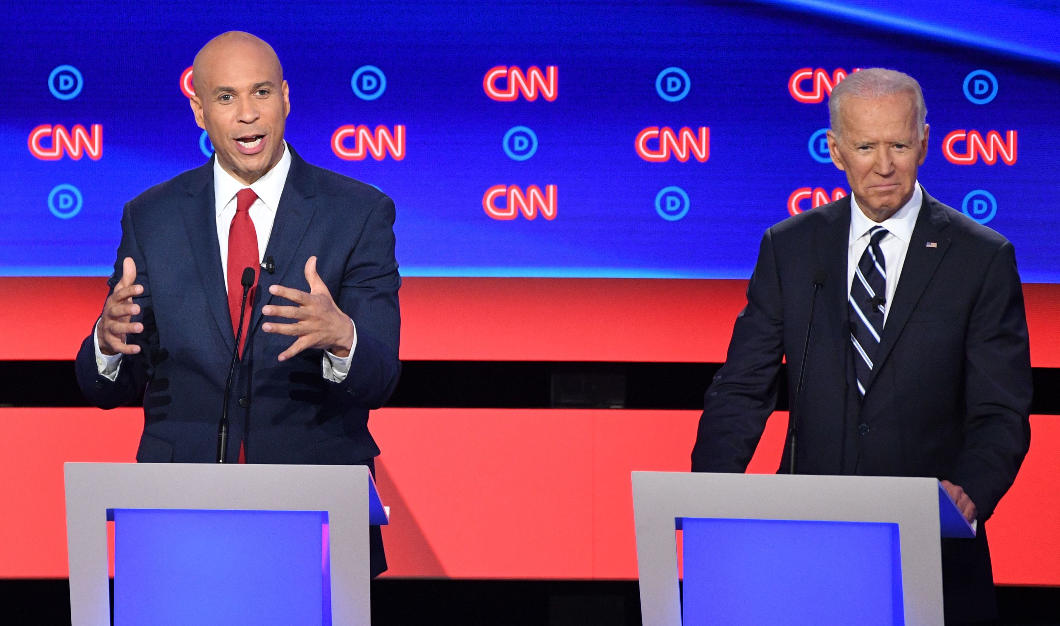 New Jersey Sen. Cory Booker delivers his closing statement flanked by former Vice President Joe Biden during the Democratic presidential debate in Detroit on Wednesday night. Booker pressed Biden on his record on criminal justice. (AFP/Getty Images)