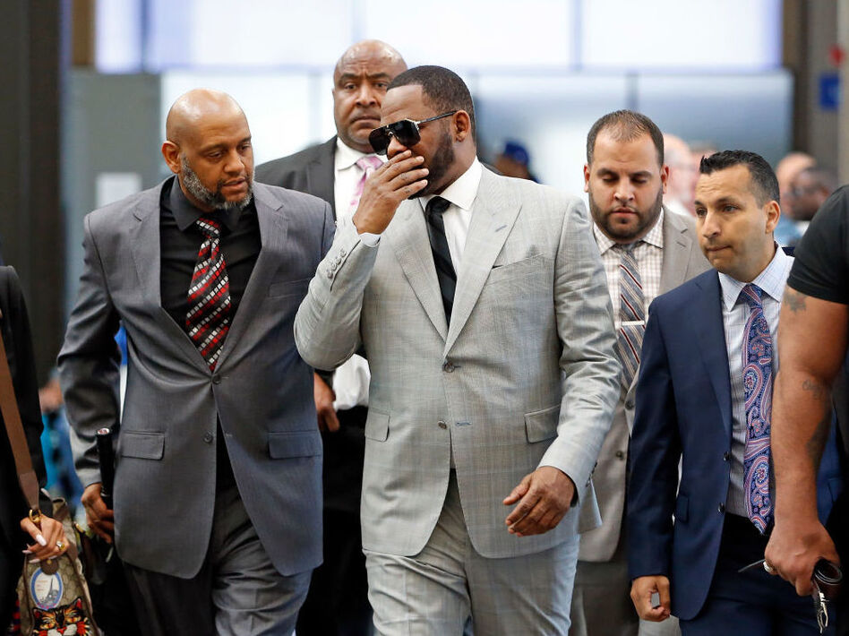 R. Kelly arrives in court in Chicago in June 2019. On Monday, Hennepin County, Minn. announced two criminal charges against the singer. (Nuccio DiNuzzo/Getty Images)