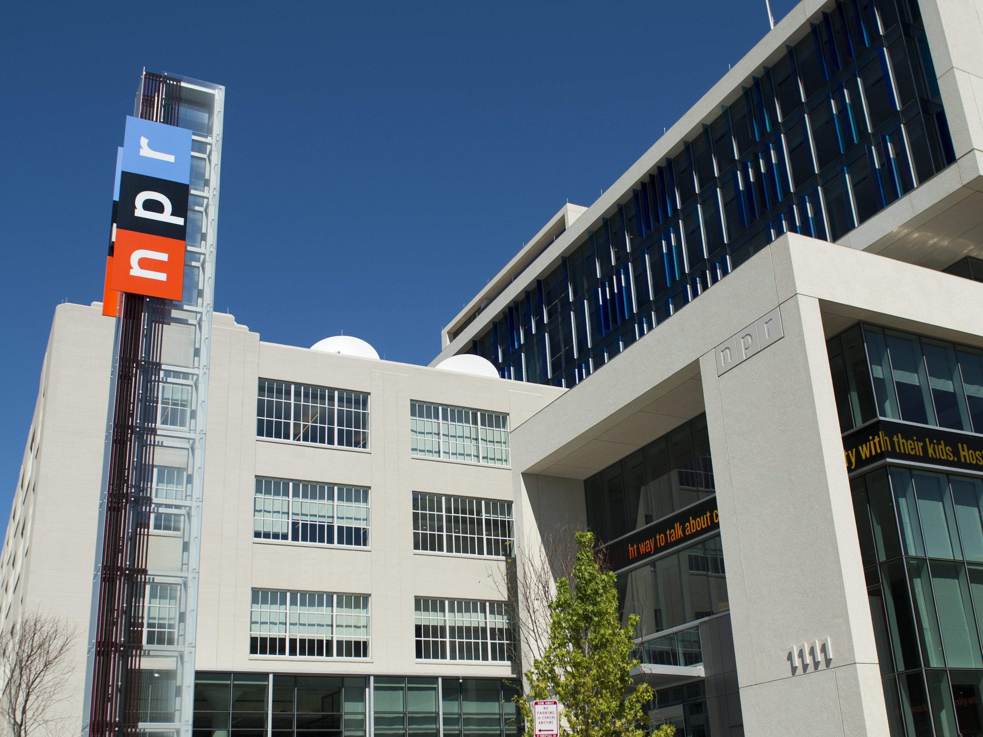 NPR is cutting some newsroom jobs as part of a restructuring move that is also adding positions in other areas, NPR's editorial chief announced Tuesday. (AFP/Getty Images)