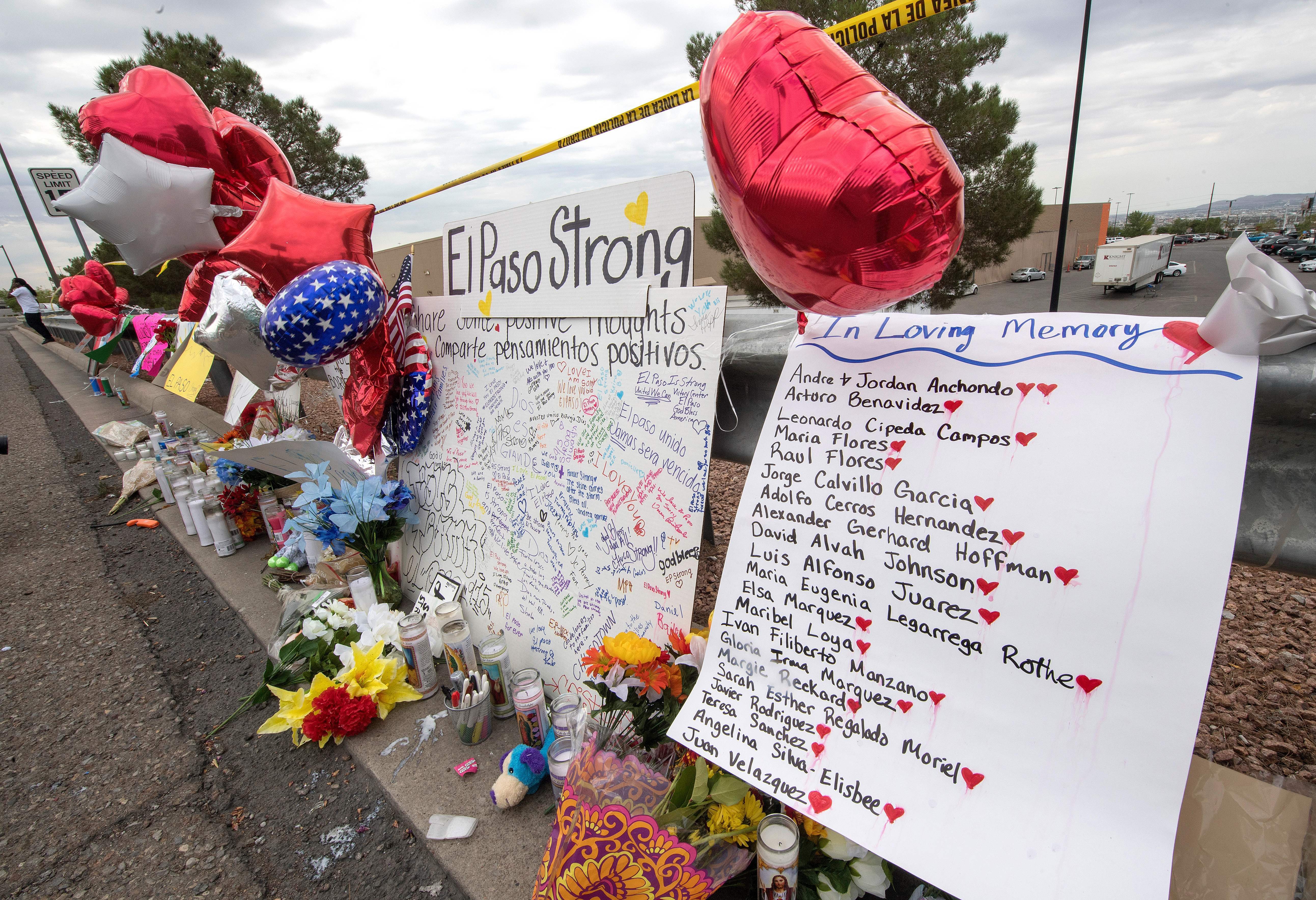 The names of the shooting victims adorn a makeshift memorial near the Cielo Vista Mall and Walmart in El Paso, Texas, on Tuesday. Saturday's shooting left 22 people dead. (Mark Ralston/AFP/Getty Images)