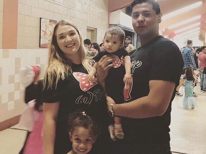 A photo shows Jordan Anchondo (left) and her husband, Andre Anchondo, with two of their children. The couple died last weekend when a gunman stormed a Walmart in El Paso, killing at least 22 people and wounding more than two dozen others. (Courtesy of Tito Anchondo)