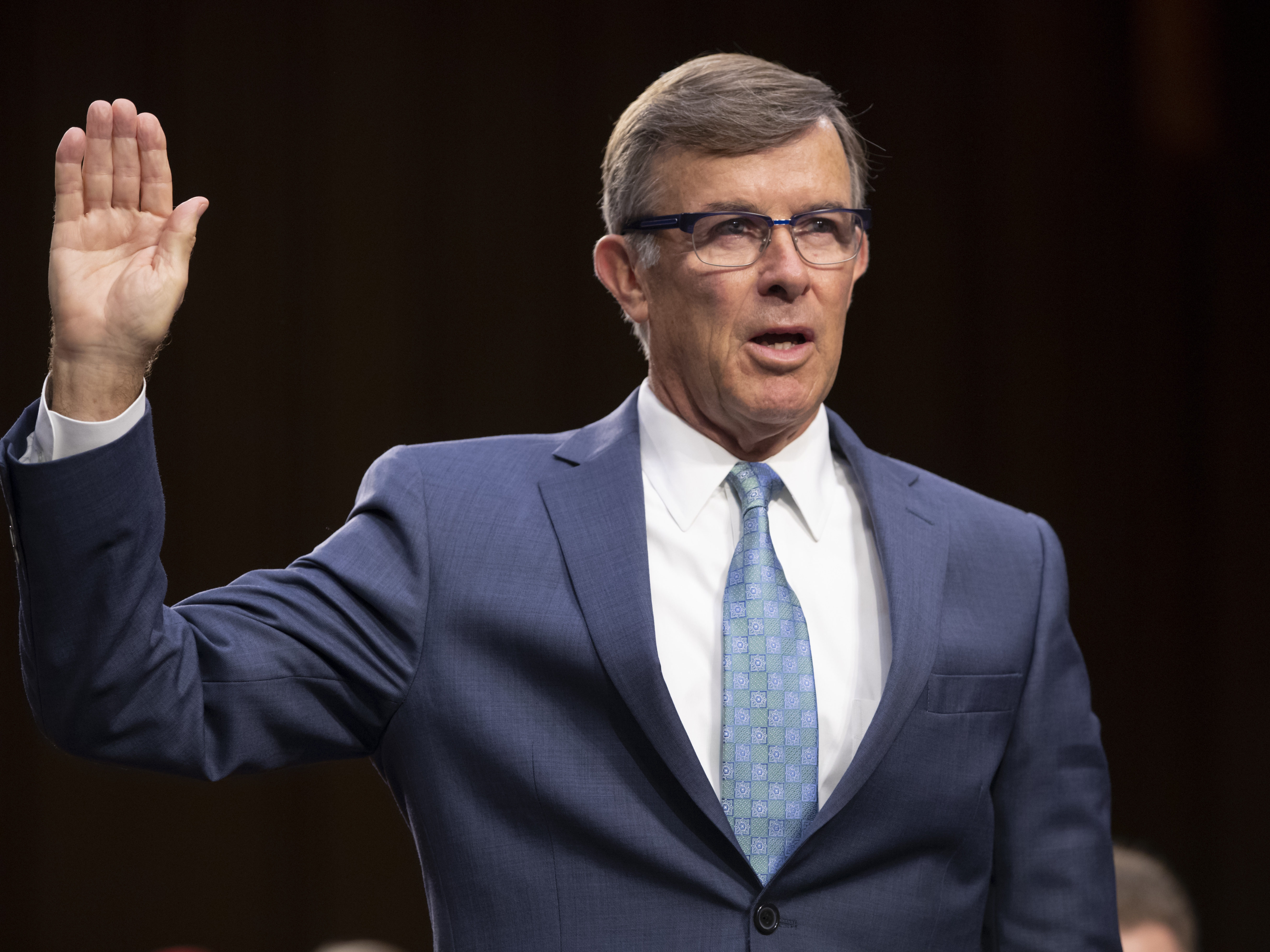 Retired Vice Adm. Joseph Maguire appears before the Senate Intelligence Committee to be confirmed as the director of the National Counterterrorism Center, in July 2018.