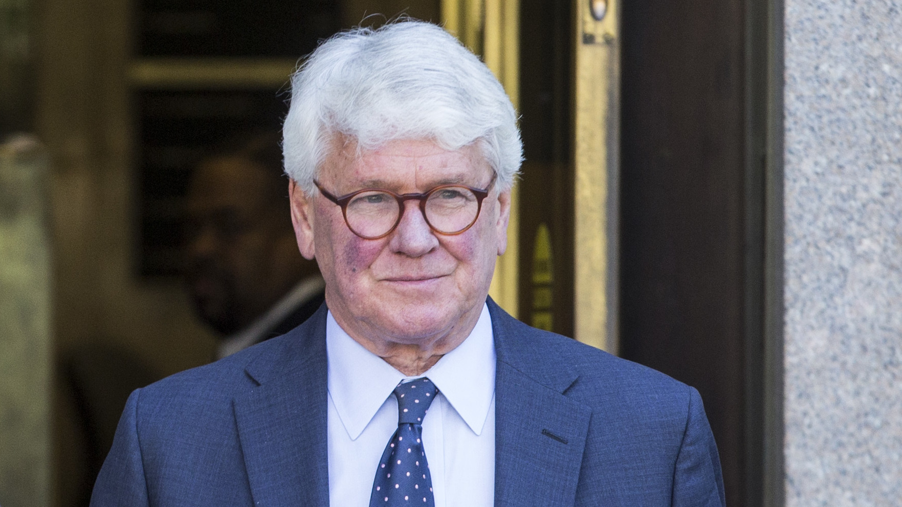 Greg Craig, who was White House counsel under President Barack Obama, departs from the U.S. District Courthouse after a hearing on April 15. His trial begins Monday. (Getty Images)