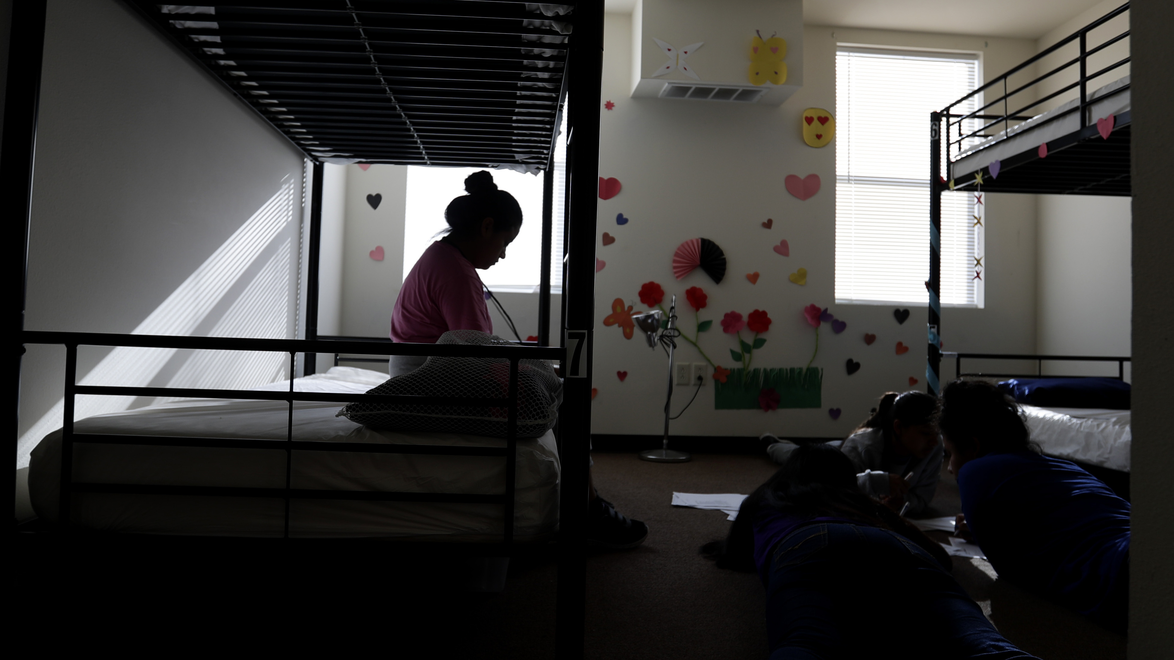 When children are held for long periods away in detention centers, such as this center for migrant children in Carrizo Springs, Texas, they may suffer psychological harm.