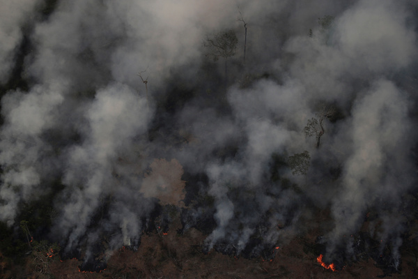 Smoke billows during a fire in an area of the Amazon rainforest near Porto Velho, Rondonia State, Brazil, on Wednesday.