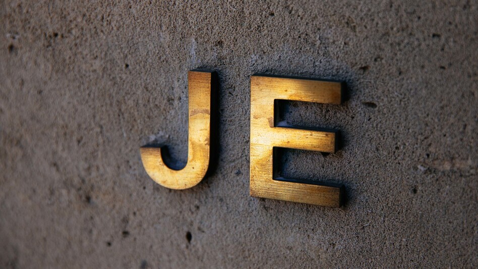 Jeffrey Epstein's monogram is displayed on the exterior of his house on New York City's Upper East Side. On Tuesday, nearly three weeks after the financier took his own life in jail, victims of his alleged sex trafficking operation told their stories in a Manhattan courtroom. (Kevin Hagen/Getty Images)