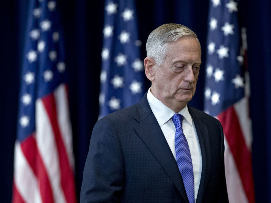 James Mattis, then U.S. secretary of defense, leaves a news conference following a meeting about U.S.-China diplomacy and security at the State Department in Washington, D.C., in June 2017. Mattis' new book, <em>Call Sign Chaos, </em>implies criticism of President Trump without taking direct shots at him. (Bloomberg via Getty Images)