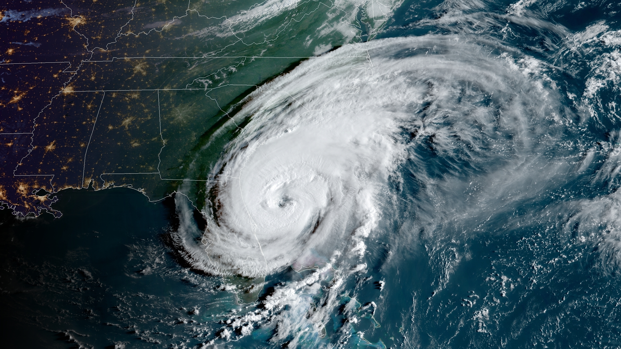 Hurricane Dorian's outer bands are lashing Florida as the storm moves northward along the U.S. coastline.