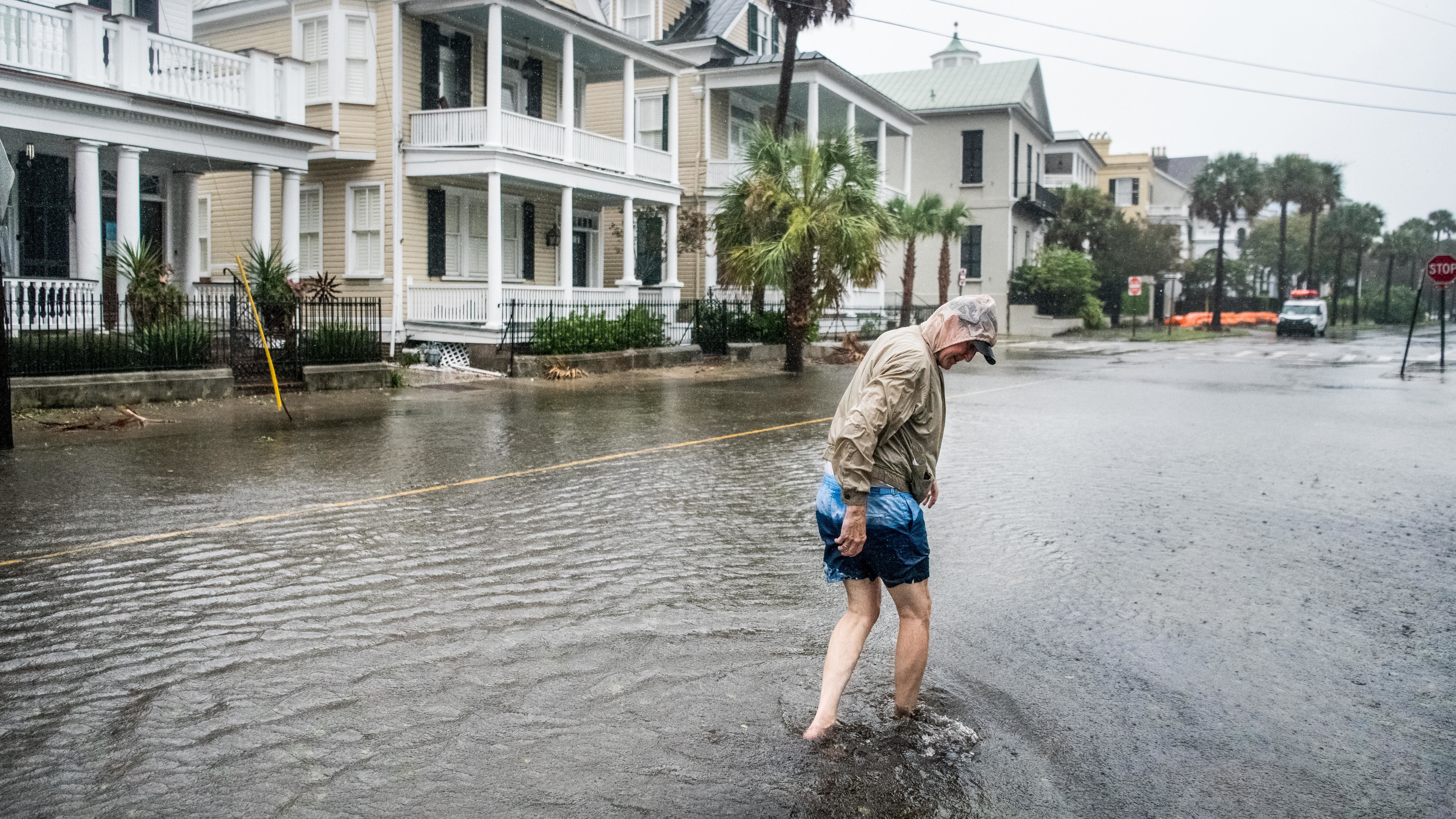 Many of the streets in Charleston, S.C., were flooded Thursday under the heavy rains of Hurricane Dorian. The storm's eyewall remained offshore at least through early afternoon — but that hasn't saved the Carolinas from severe winds and flooding.