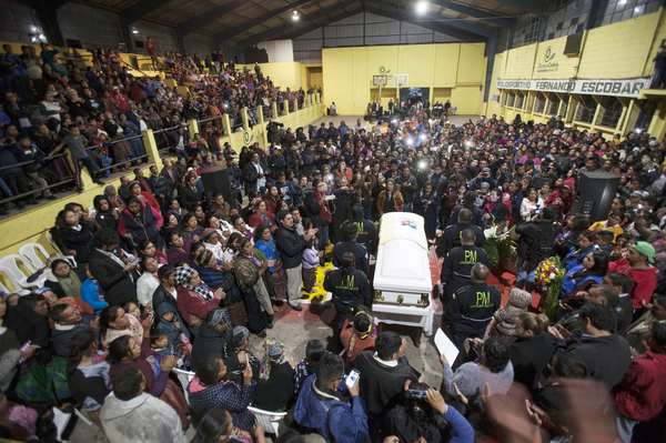 Neighbors attend the wake for Claudia Patricia Gomez Gonzalez in San Juan Ostuncalco, Guatemala. She was shot by a U.S. Border Patrol agent near Laredo, Texas, in May 2018. The 20-year-old was unable to find a job so she had left Guatemala to join her boyfriend in Maryland, according to her father, Gilberto Gomez.