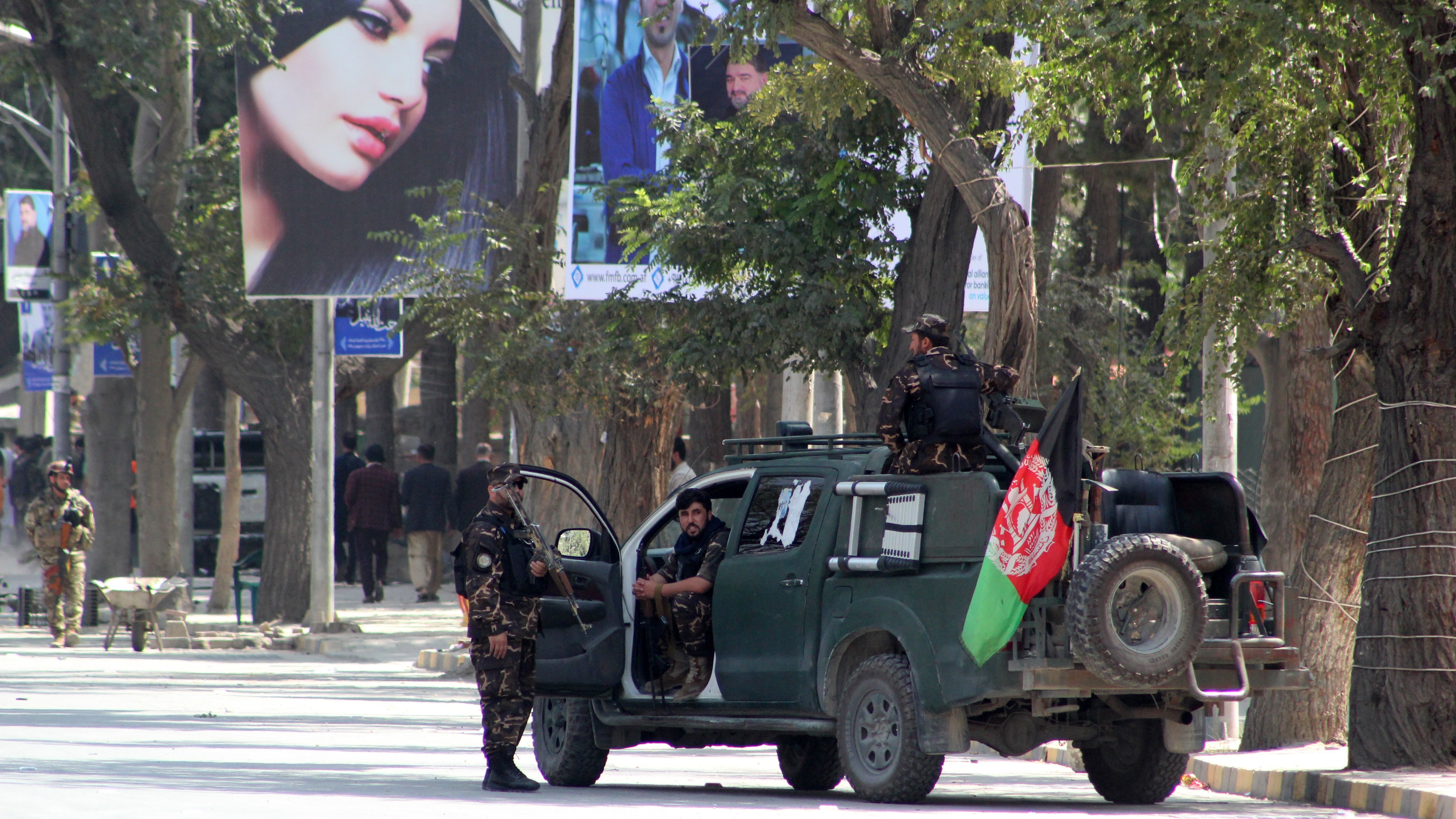 Many Afghans approve of President Trump's decision to quash a potential deal with the Taliban. Here, security forces guard a street in Kabul last week after a suicide car bombing rocked the capital's diplomatic enclave. (Anadolu Agency via Getty Images)