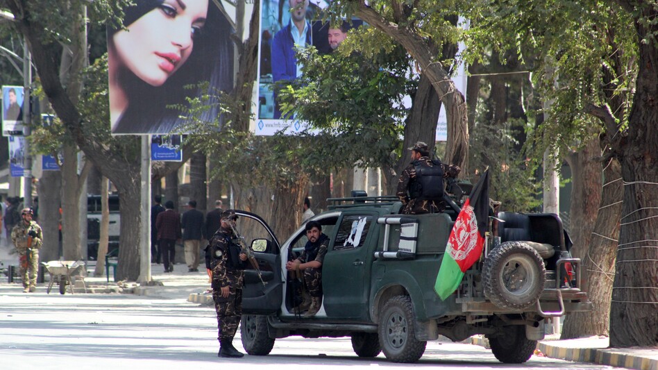 Many Afghans approve of President Trump's decision to quash a potential deal with the Taliban. Here, security forces guard a street in Kabul last week after a suicide car bombing rocked the capital's diplomatic enclave. (Sayed Khodaberdi Sadat/Anadolu Agency via Getty Images)