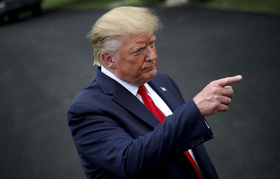President Trump, seen speaking to reporters at the White House on Monday, has fired his national security adviser. With John Bolton gone, what does that mean for Afghanistan peace talks and other major foreign policy? (Win McNamee/Getty Images)