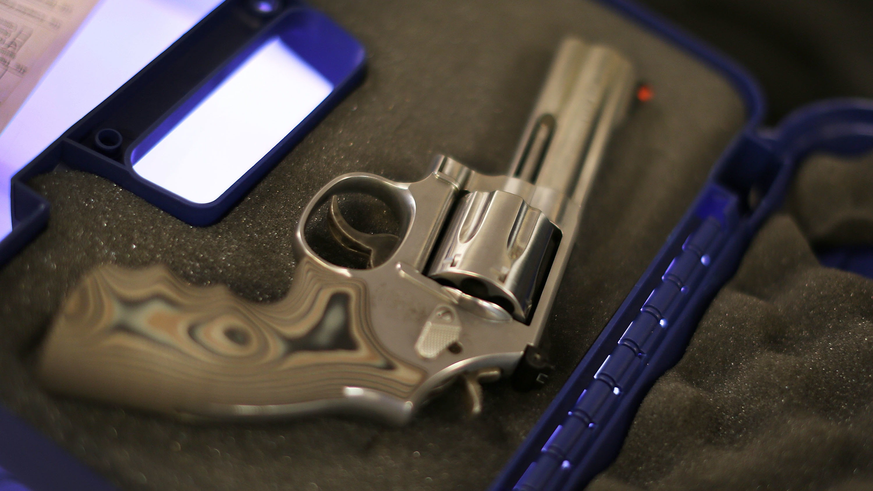 In the U.S., firearms kill more people through suicide than homicide. (Joe Raedle/Getty Images)