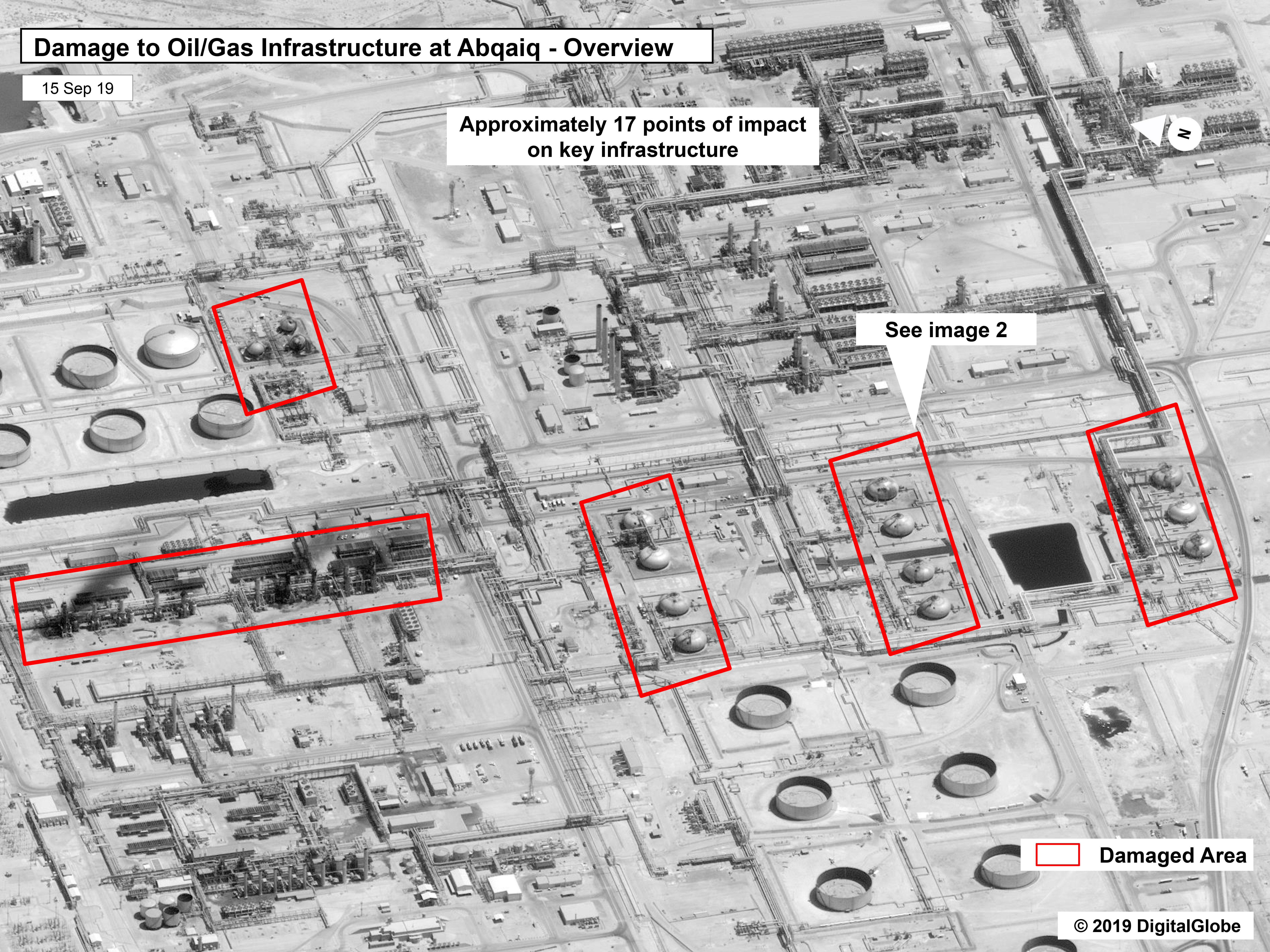 Pentagon officials say U.S. satellites detected Iran readying drones and missiles at launch sites prior to the attack on a Saudi oil facility on Saturday. Here, an image provided by the U.S. government and DigitalGlobe (and annotated by the source) shows damage to the infrastructure at Saudi Aramco's Abqaiq oil-processing facility.