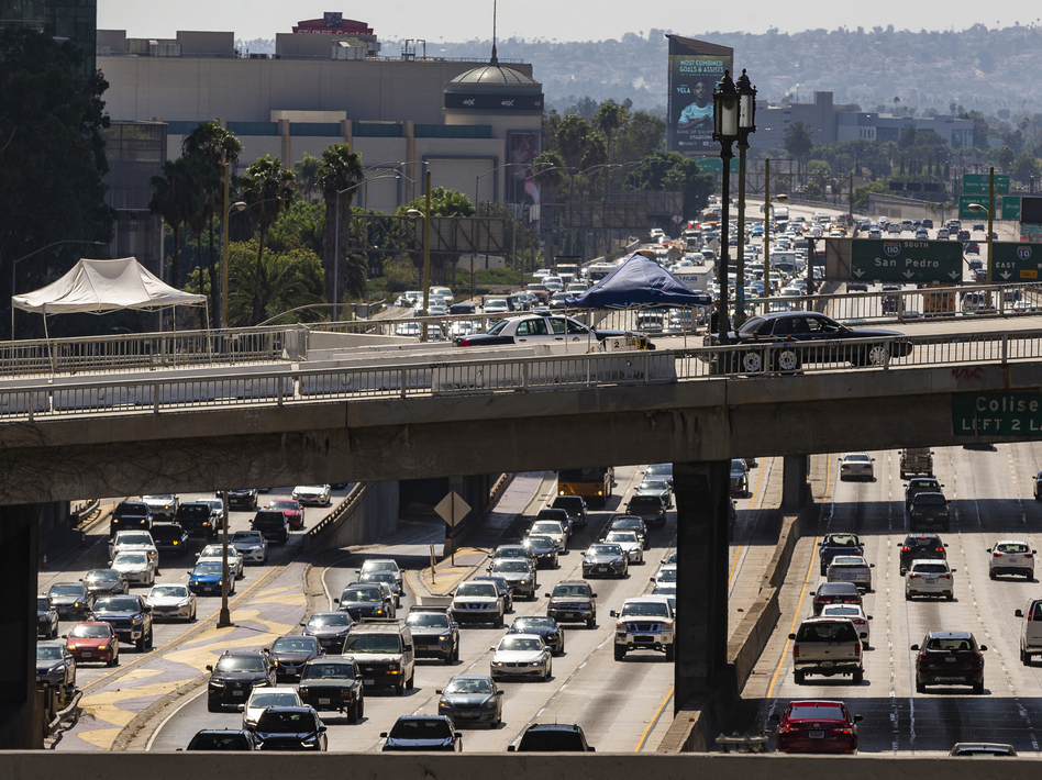 A view over the Harbor Freeway in Los Angeles on Tuesday. President Trump says his administration will revoke a waiver that allows California to set its own vehicle emissions standards. (Damian Dovarganes/AP)