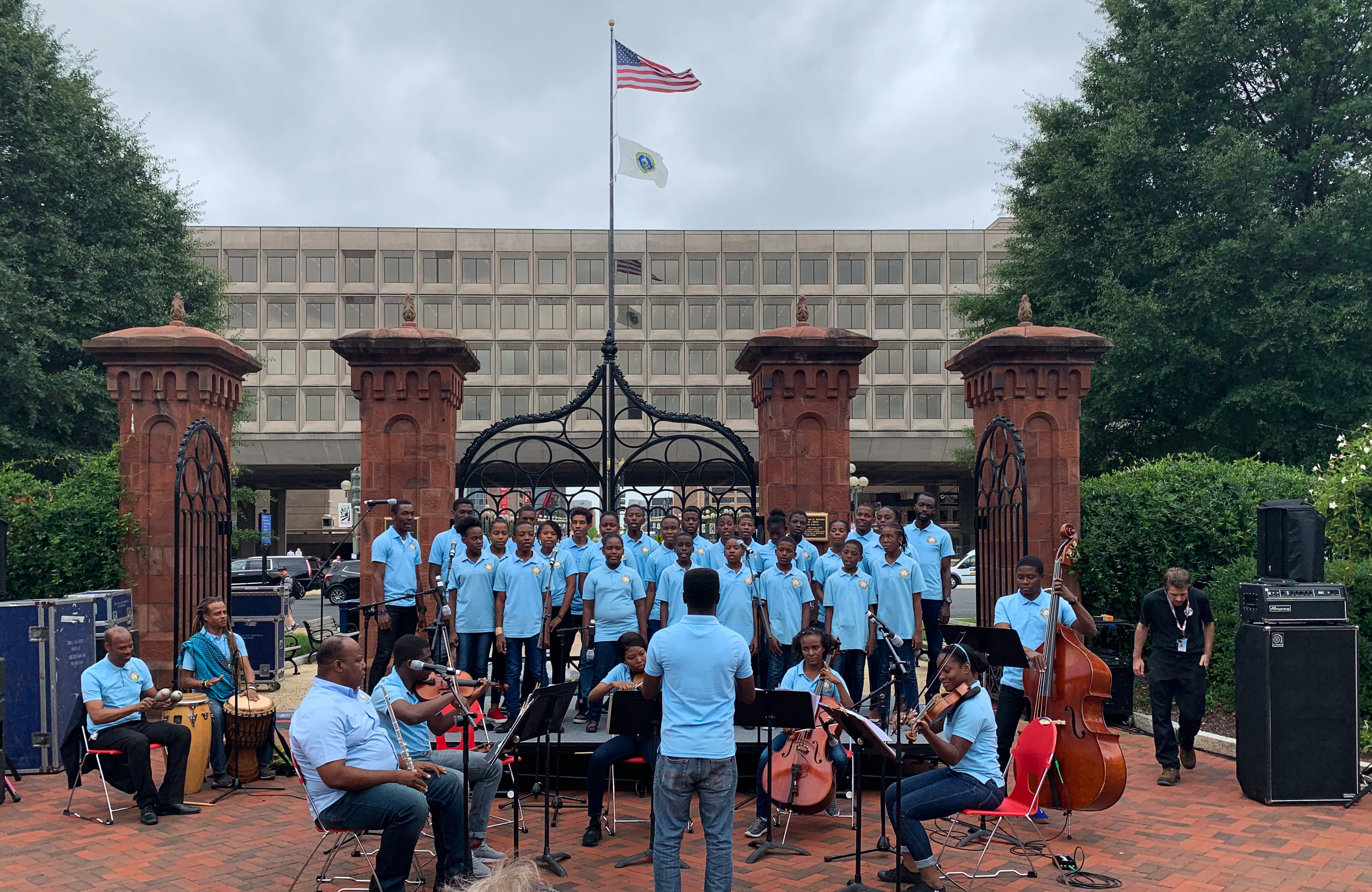 Holy Trinity Music School's youth choir and chamber orchestra perform in the Smithsonian's Enid A. Haupt garden in Washington, D.C. (NPR)