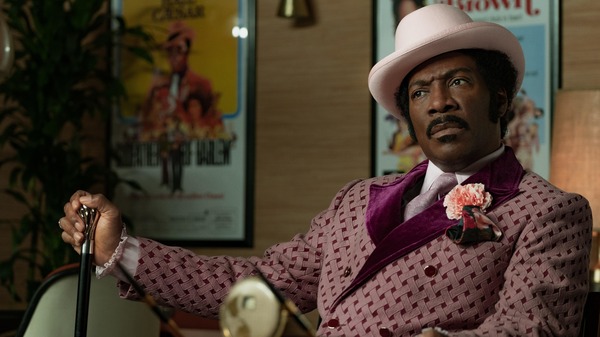 In Dolemite Is My Name, Eddie Murphy leads the star-studded biopic about Rudy Ray Moore whose iconic alter ego became a Blaxploitation legend.