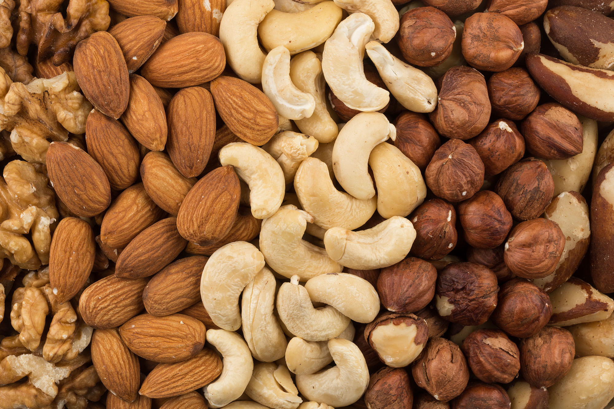 Just A Handful Of Nuts May Help Keep Us From Packing On The Pounds