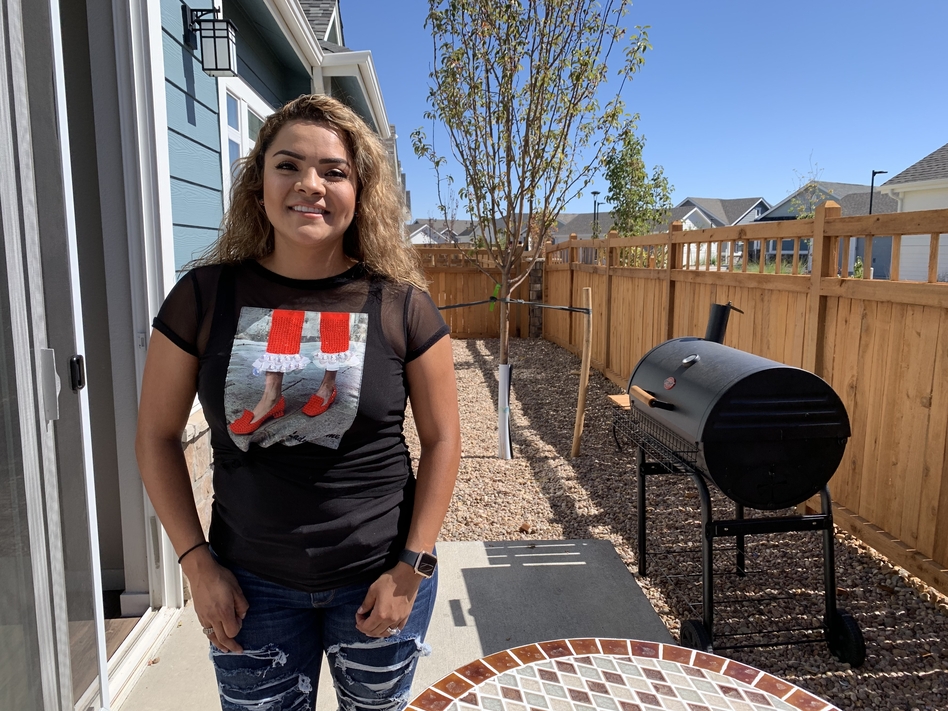 Itzel Alarcon recently moved into a rental development near Denver. She says she's renting for now because she saw relatives hurt by the housing crash and is worried that home values might drop again. (Chris Arnold/NPR)