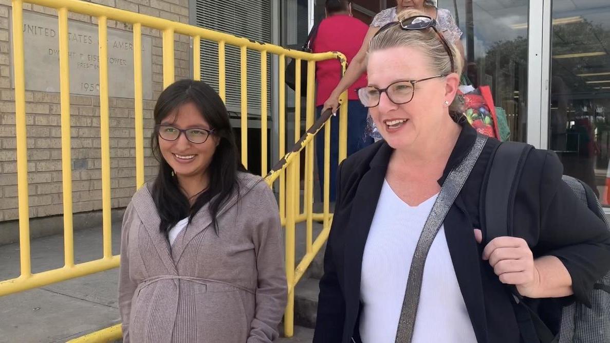Yulisa and her attorney, Jodi Goodwin, walk out of a Customs and Border Protection facility after Yulisa is allowed to wait in the U.S. until her next immigration court hearing.
