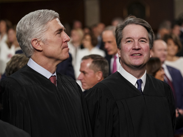 Justice Neil Gorsuch, left, seen here with Justice Brett Kavanaugh, asked many of the key questions in Tuesday's case before the U.S. Supreme Court that centered on whether employers can fire gay or transgender workers.