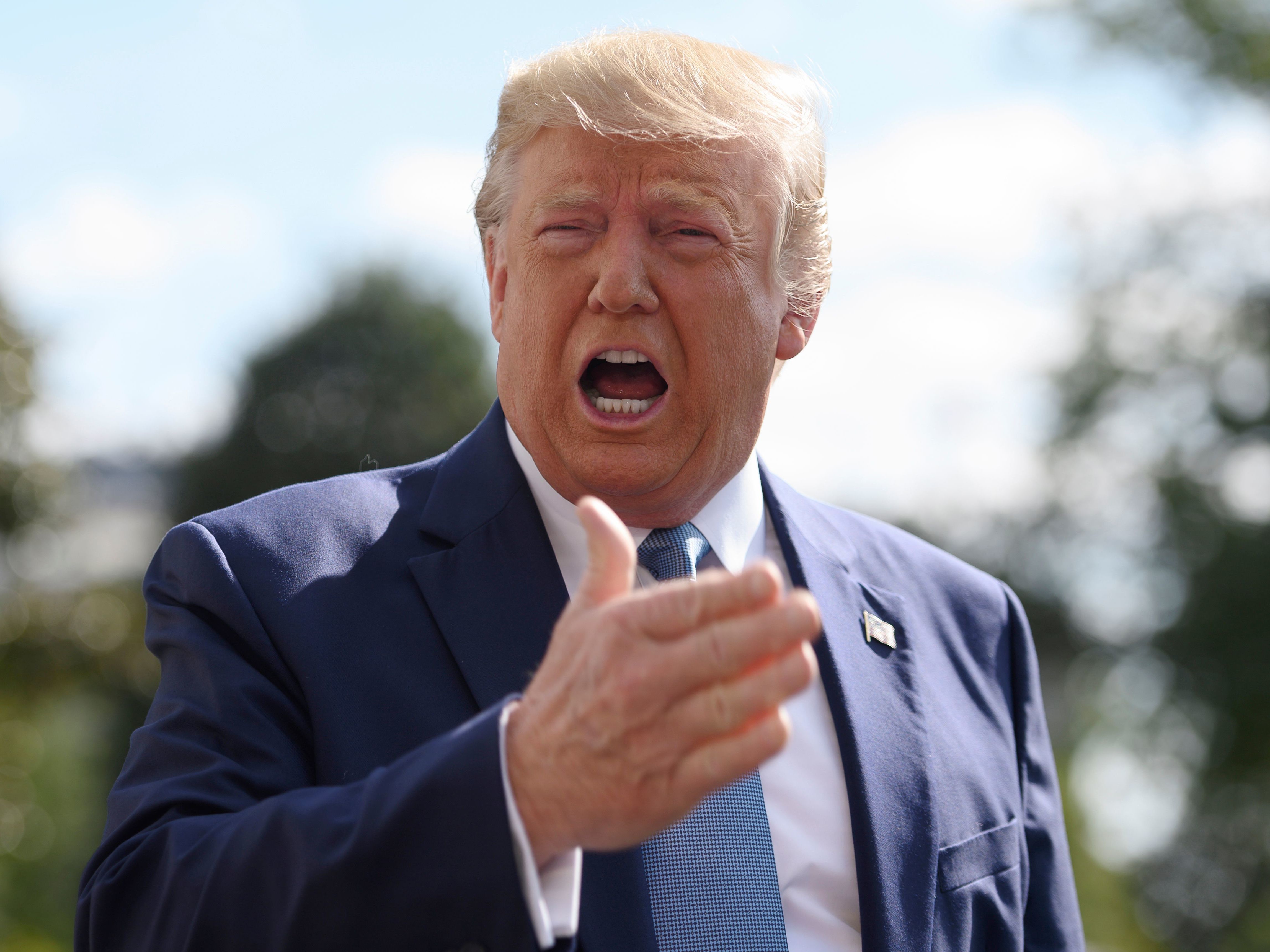 President Trump speaks to reporters outside the White House on Oct. 4. The White House sent a letter to House Democrats saying it would not cooperate with requests as part of their impeachment inquiry. (AFP via Getty Images)