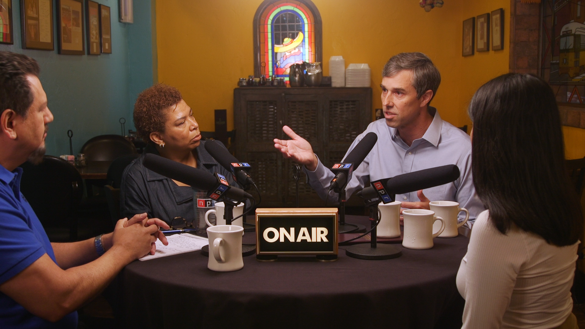 Presidential hopeful Beto O'Rourke talks to NPR Host Michel Martin and voters Ruben Sandoval and Connie Martinez. (NPR)