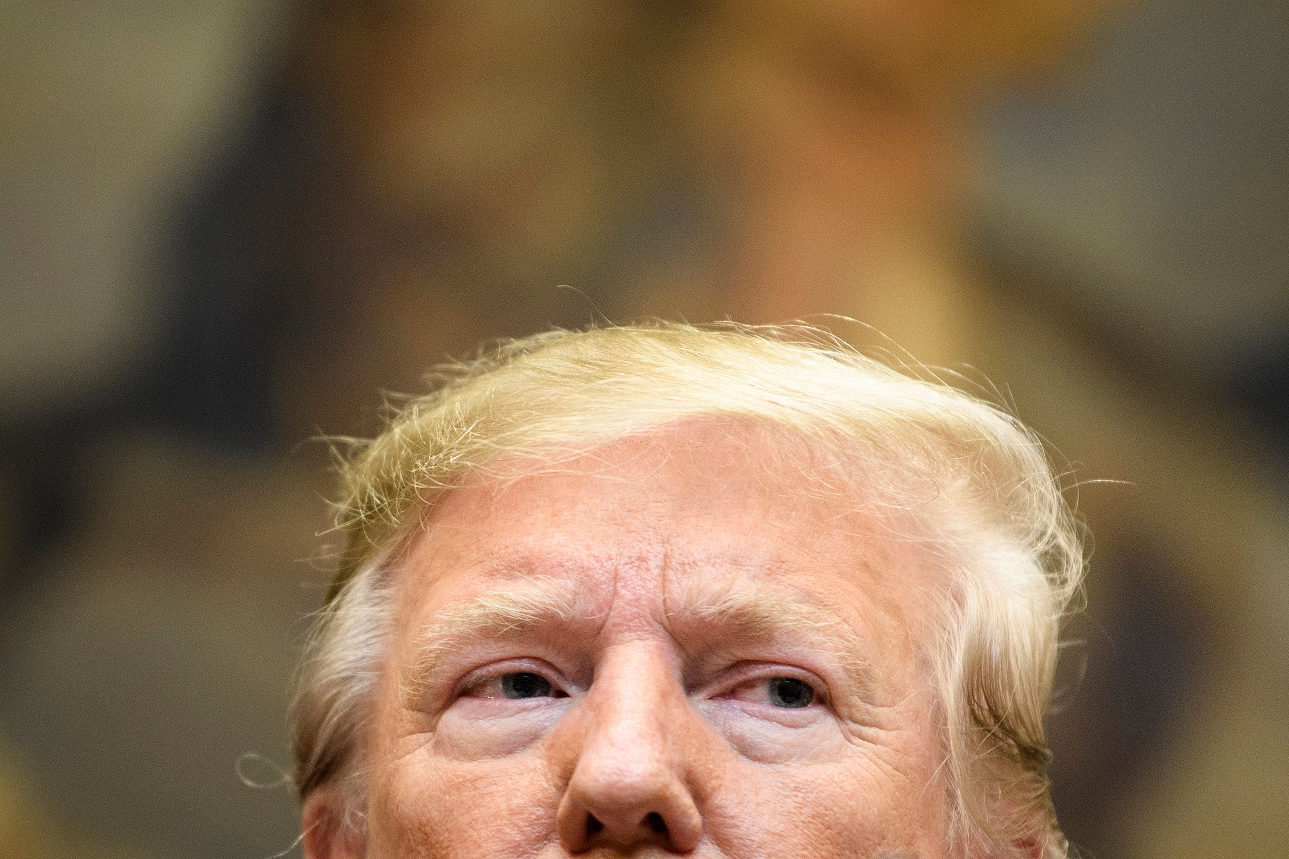 President Trump speaks at the White House Oct. 9, 2019. An NPR analysis of his tweets shows Trump using very different language and insults when sparring with white and non-white Democratic lawmakers.