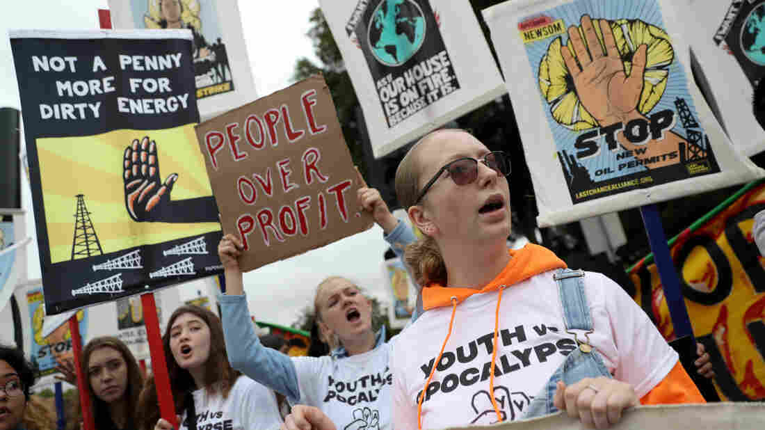 SAN RAMON, CALIFORNIA - SEPTEMBER 27: Youth climate activists hold signs during a Climate Strike youth protest outside Chevron headquarters on September 27 2019 (Photo by Justin Sullivan/Getty Images)