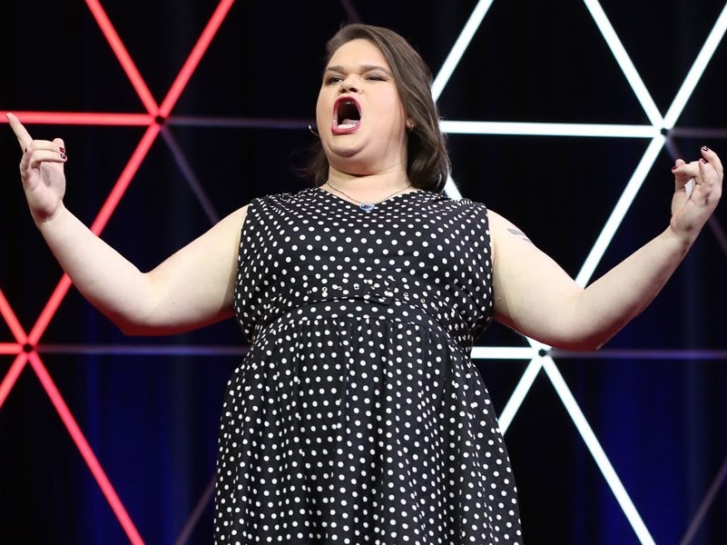 Jordan Raskopoulos on the TED stage. (TEDxSydney)