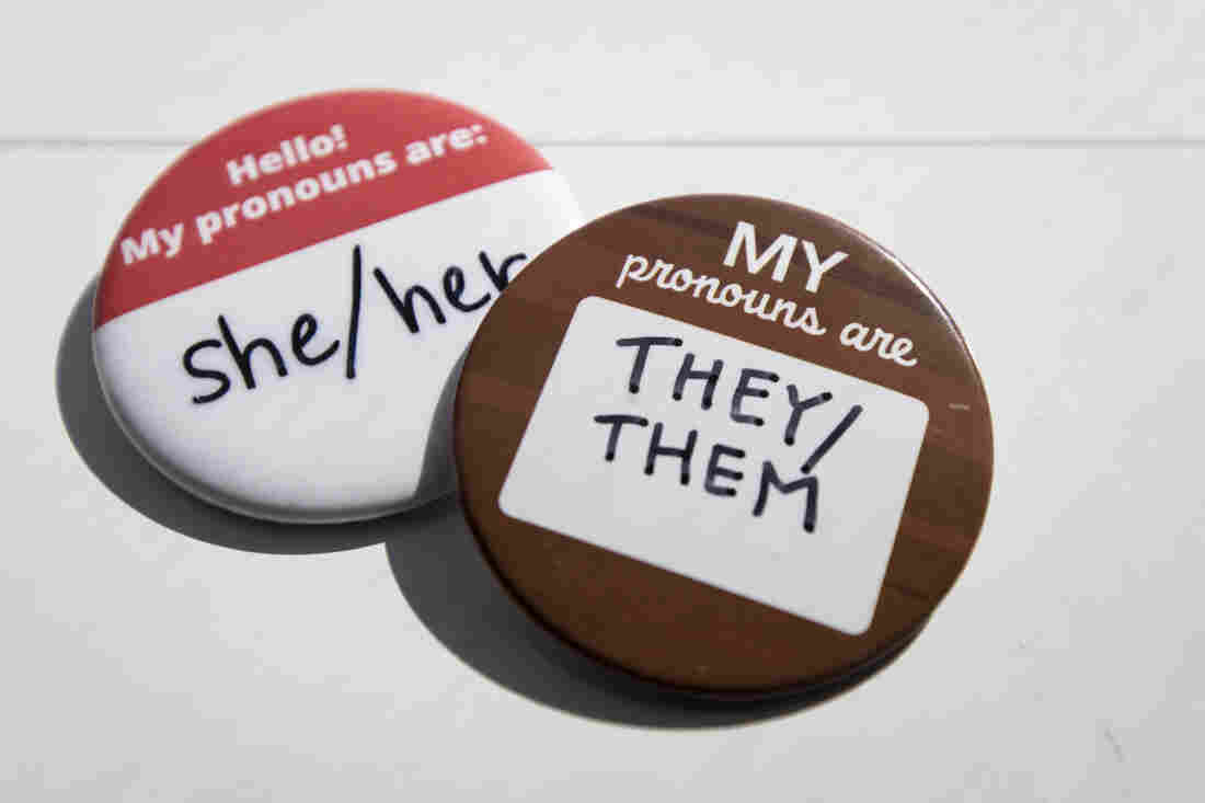 Buttons with spaces for the wearer to indicate pronouns.