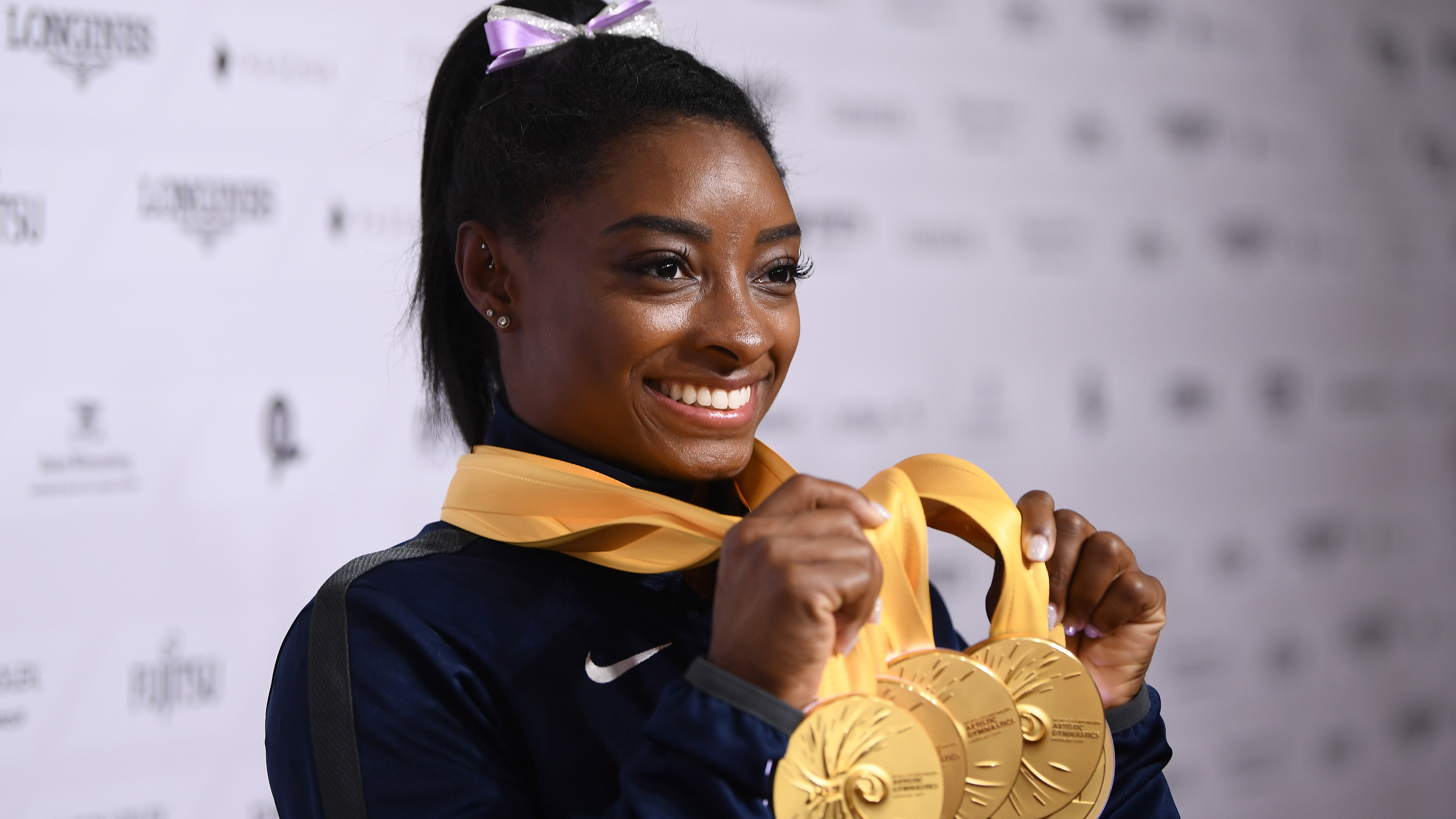 Simone Biles Becomes The Most Decorated Gymnast In World Championship History - NPR thumbnail