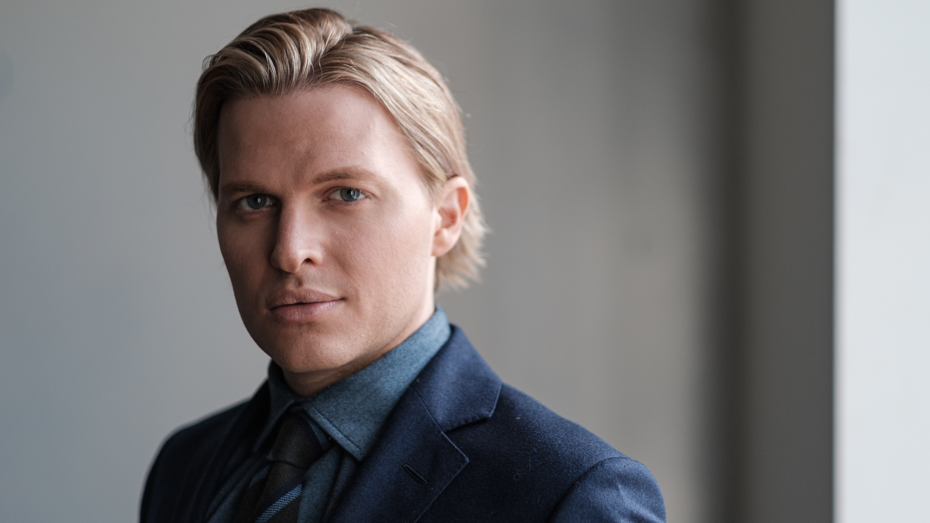Pulitzer Prize-winning investigative journalist Ronan Farrow poses for a portrait in NPR's Manhattan offices ahead of the release of his book <em>Catch and Kill.</em> (A.J. Chavar for NPR)