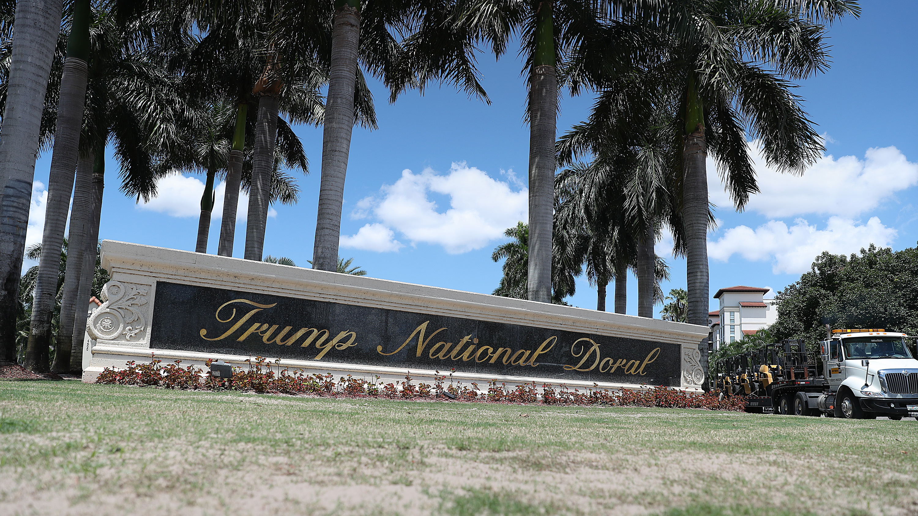 The entrance to the Trump National Doral golf resort just outside of Miami. President Trump's continued ownership and promotion of his resorts while serving in office has been controversial and is the subject of multiple investigations and lawsuits. (Getty Images)