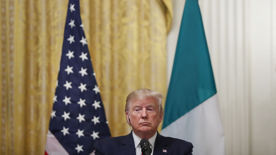 President Trump listens during a news conference with Italian President Sergio Mattarella at the White House on Wednesday. (Pablo Martinez Monsivais/AP)
