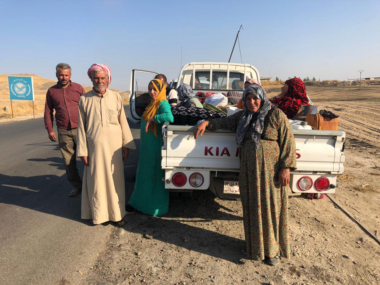 Mohammed Sheikho and his family fled heavy fighting in their town of Tel Abyad, Syria, and had been on the run for three days trying to reach safety in Iraq, when NPR encountered them in northeastern Syria on Sunday. (NPR)