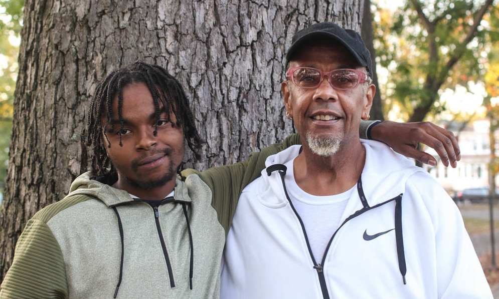 Before Guy Bryant (right) took Romario Vassell (left) into foster care, Vassell had been living in a homeless shelter. (Jey Born for StoryCorps)