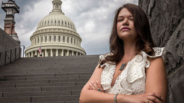 Brittany Kaiser, former employee of Cambridge Analytica, stands near the Capitol building in Washington, D.C. on July 31.