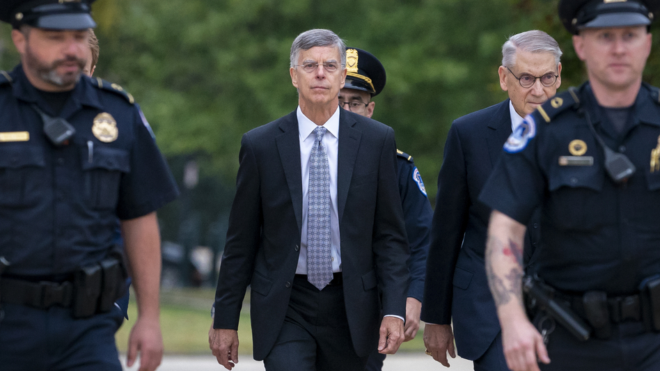 Acting Ambassador William Taylor is escorted by U.S. Capitol Police on Tuesday as he arrives to testify before House committees as part of the Democrats' impeachment inquiry into President Trump. (J. Scott Applewhite/AP)