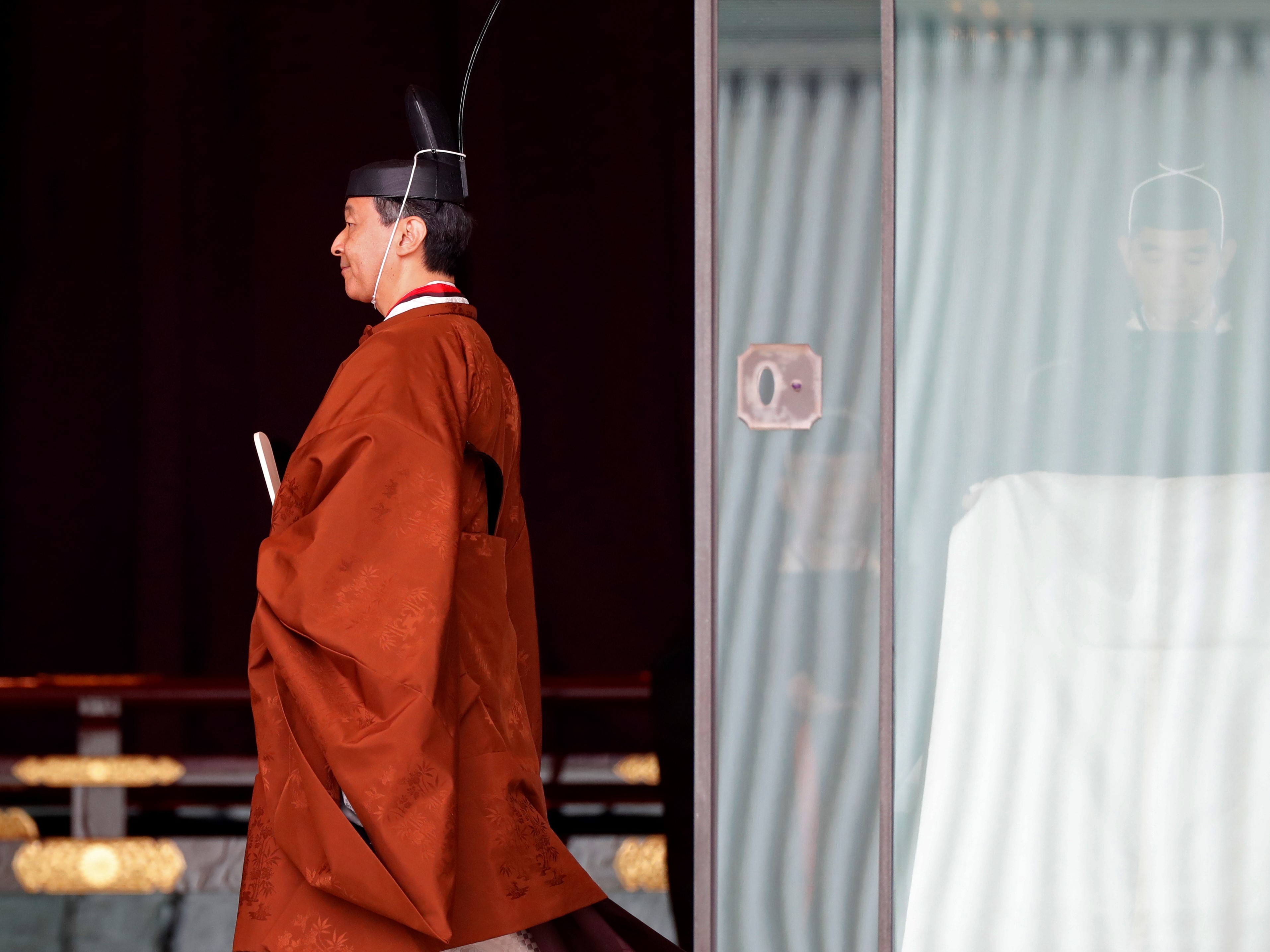 Japan revises law on royals, keeps blocking women from throne 1 Japan's Emperor Naruhito leaves following a ceremony to proclaim his enthronement to the world at the Imperial Palace in Tokyo in 2019.