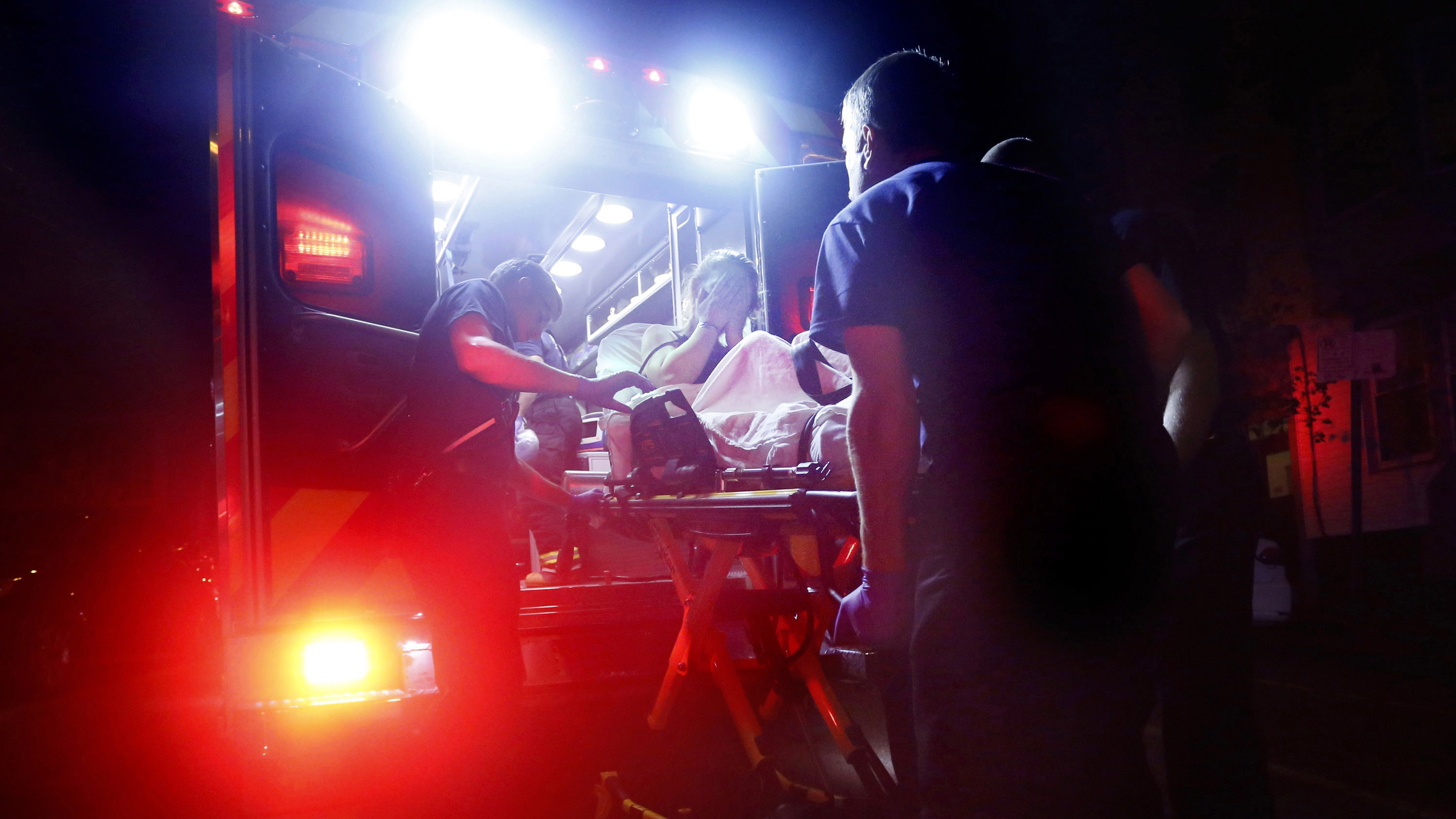 Paramedics in Portland, Maine, respond to a call for a heroin overdose. A new report estimates some $60 billion was spent on health care related to opioid addiction in 2018.