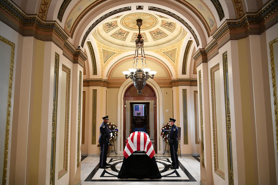 The flag-draped casket of U.S. Rep. Elijah Cummings (D-MD) is seen at Chamber doors in the Will Rodgers Corridor as the late congressman is prepared to lie in state during a memorial service at the Statuary Hall of the U.S. Capitol October 24, 2019 in Washington, DC. Rep. Cummings passed away on October 17, 2019 at the age of 68 from "complications concerning longstanding health challenges." (Mandel Ngan/Pool/Getty Images)