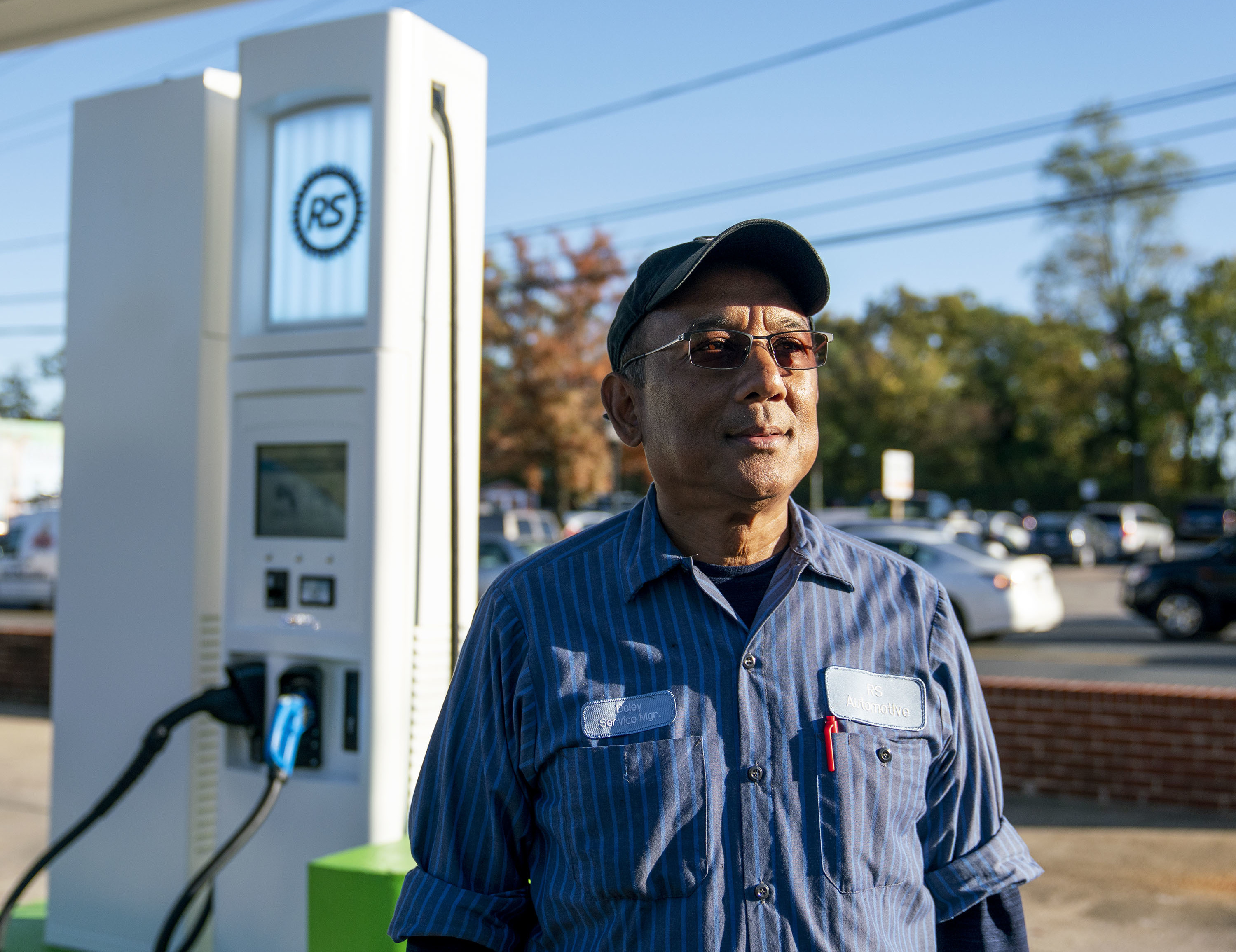 Depeswar Doley's RS Automotive in Takoma Park, Md., is the first U.S. gas station to be fully converted to an electric vehicle charging center. (NPR)