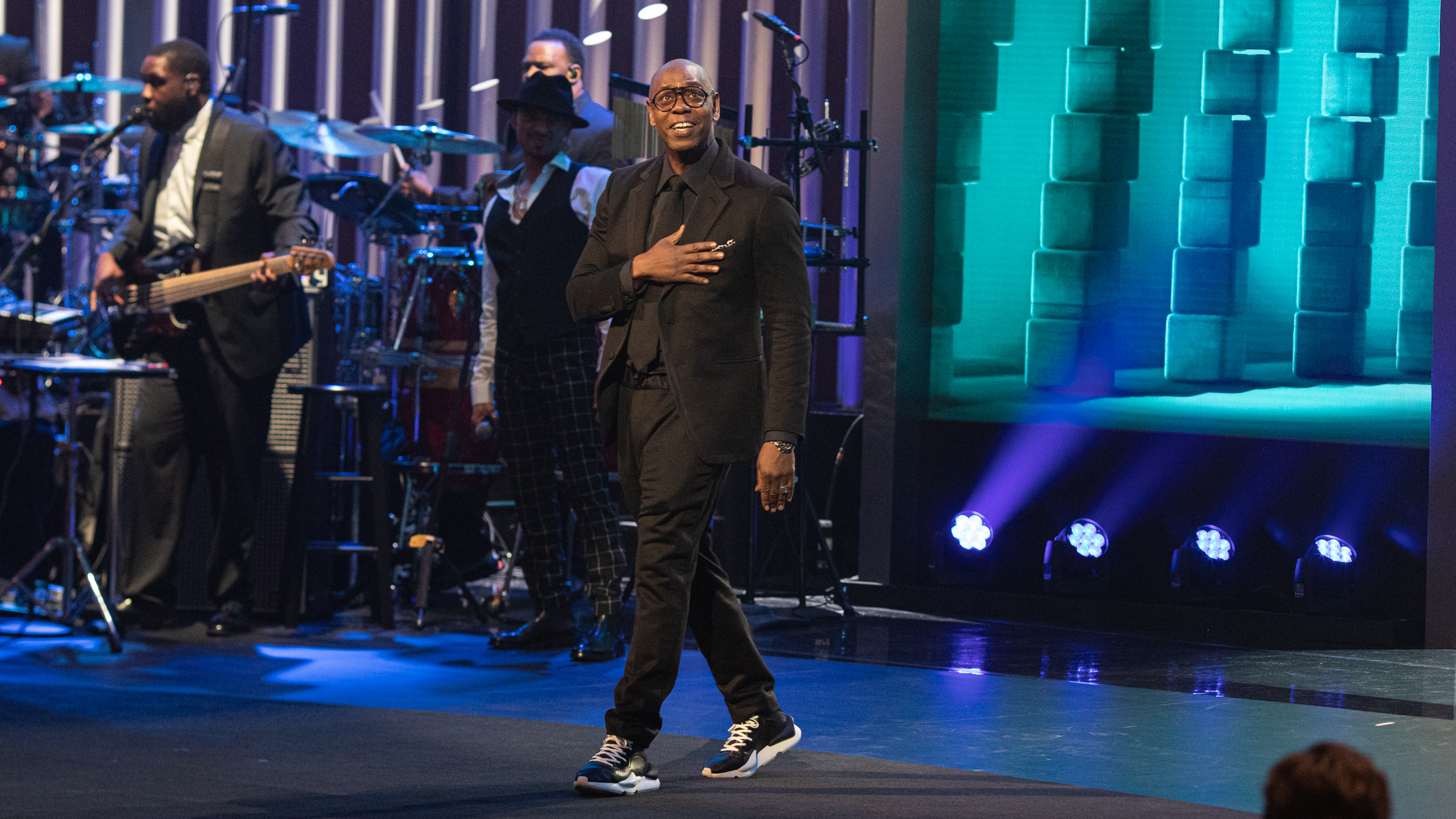 Dave Chappelle accepts the Mark Twain Prize for American Humor at the John F. Kennedy Center for the Performing Arts. PBS will air a television special of the ceremony in January.